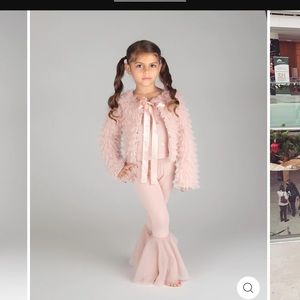 Beautiful unworn jacket and matching pants set.